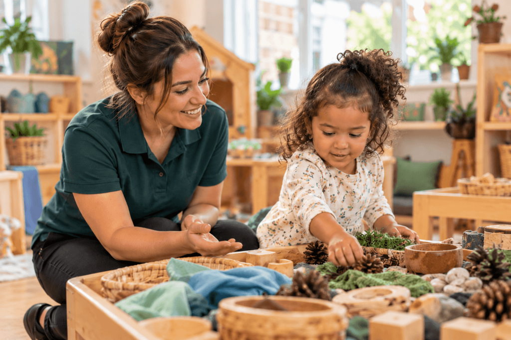Nature Play in a Cozy Classroom 1 | Parentacom A practitioner following a child's lead with open-ended materials in an early years setting